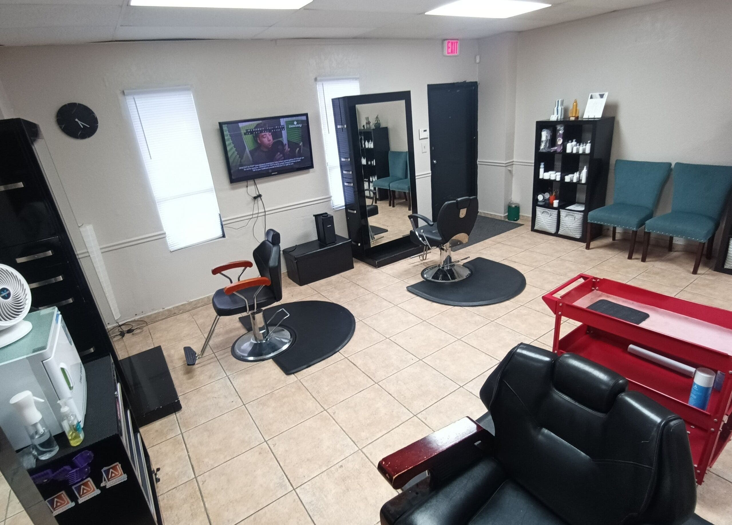 Interior of AJ Styles You Salon in Orlando, Florida, US, featuring styling chairs and modern decor.