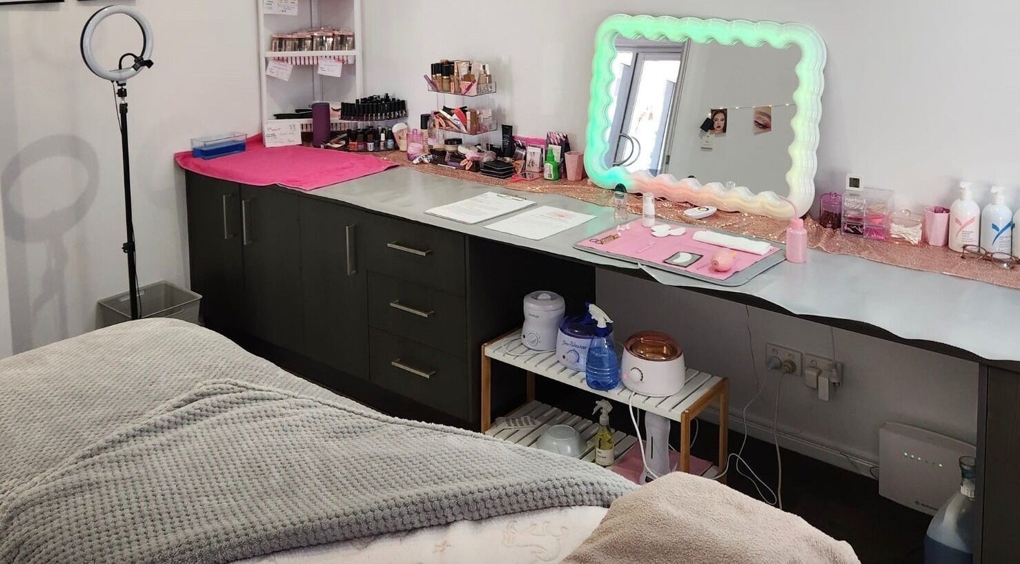 Cosy treatment room at Beira Beauty in Minyama, Queensland, AU with modern makeup setup.