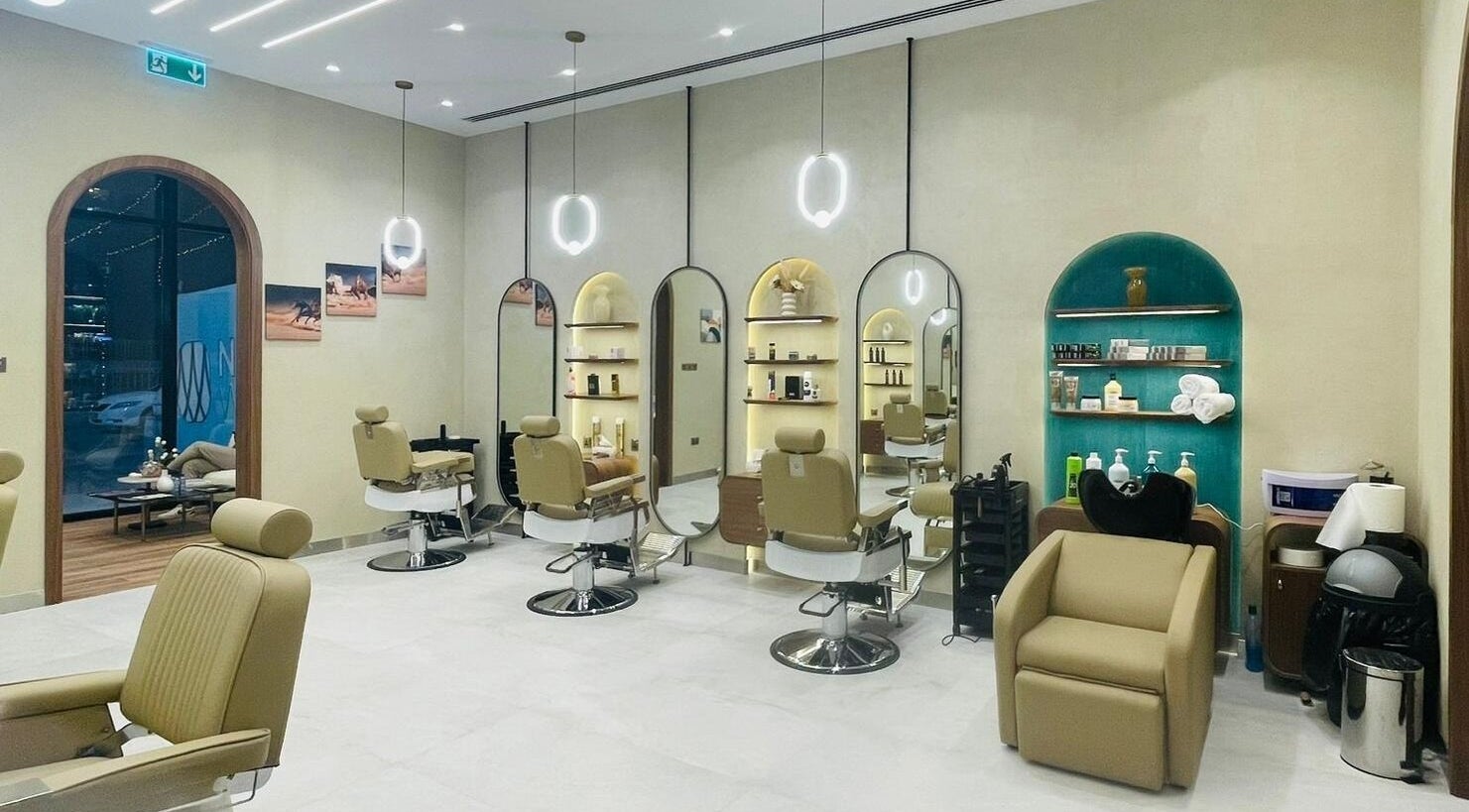 Modern interior of Zaks and Sons Salon and Spa, Manama, Capital Governorate, BH with stylish seating and mirrors.