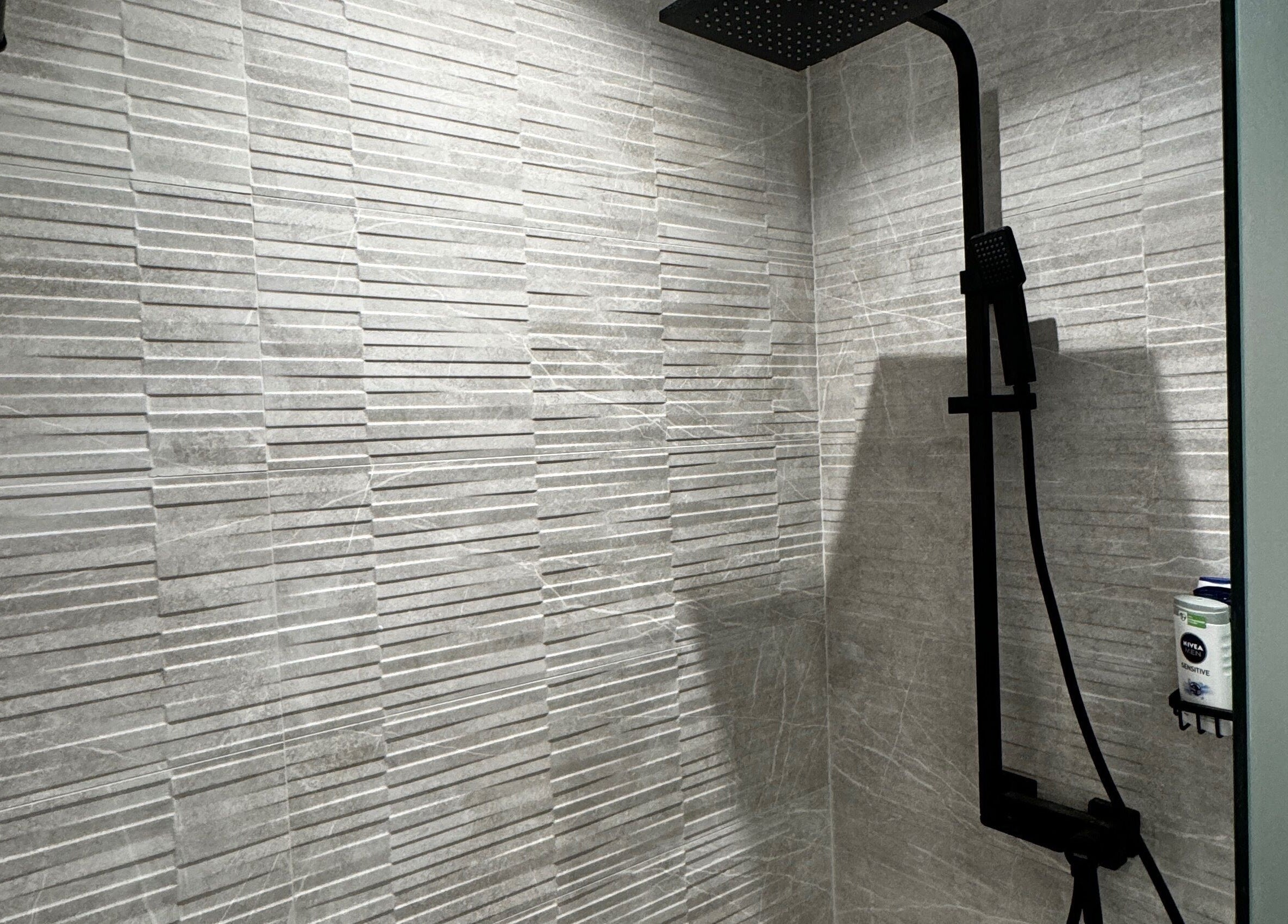 Luxurious shower area with modern fixtures at Zaks and Sons Salon and Spa, Manama, Capital Governorate, BH.