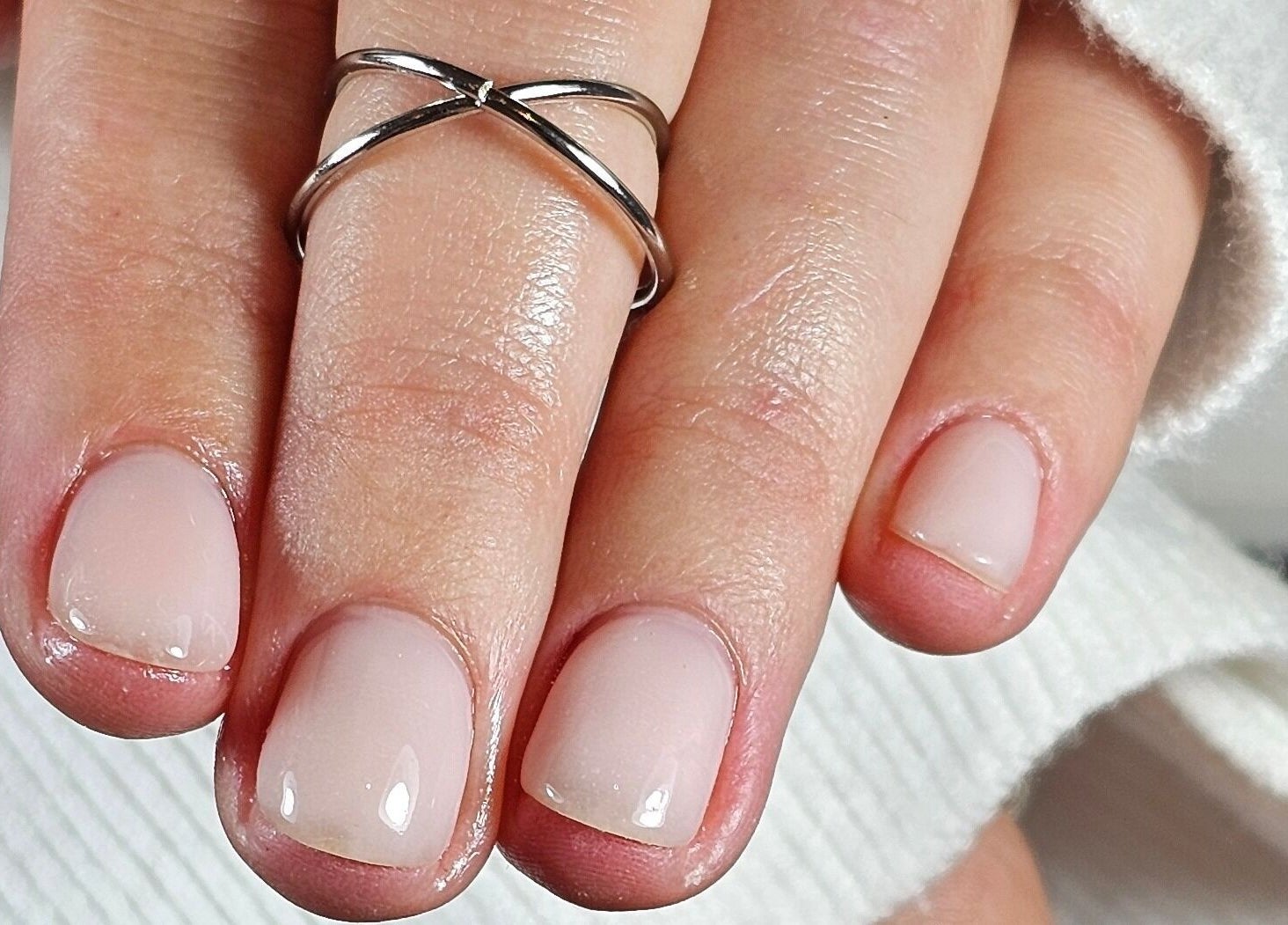 Elegant nude manicure at ShellB Nails, Cape Town, Western Cape, ZA. Perfectly polished nails showcase subtle elegance.
