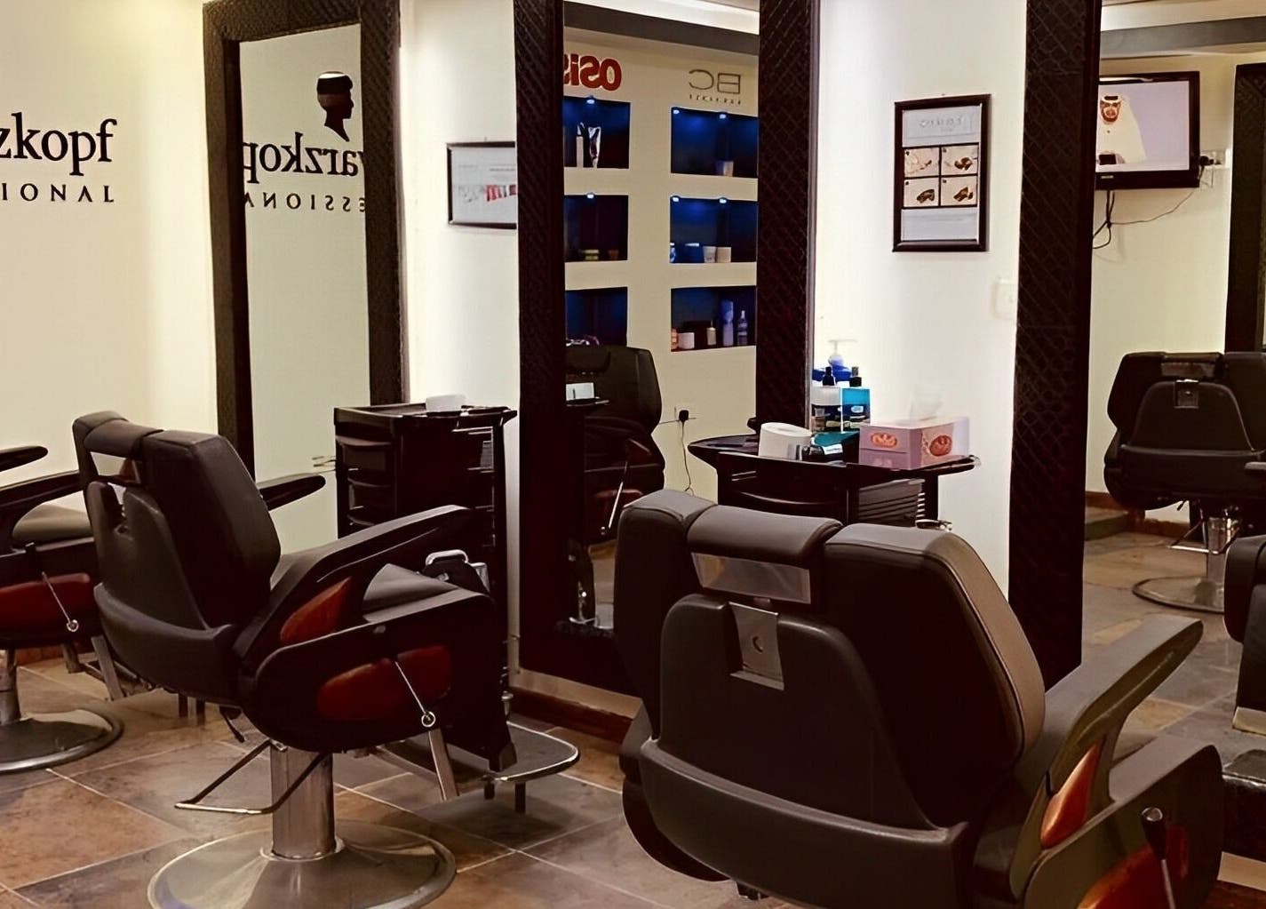 Chic barber chairs in Golden Desert Spa For Men, Abu Dhabi, offering premium grooming services.