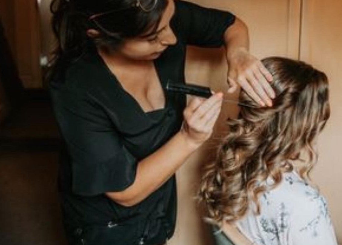 Stylist crafting elegant hair at Get Glam Hair & Aesthetics, Oldland Common, England, GB.