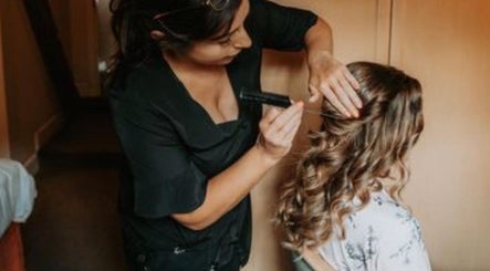 Stylist crafting elegant hair at Get Glam Hair & Aesthetics, Oldland Common, England, GB.