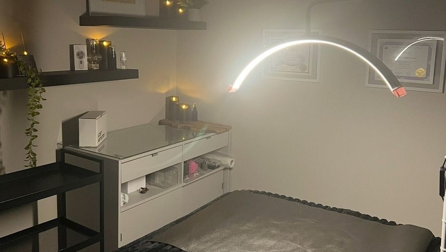 Tranquil spa room at Angelica’s Glow Bar in Maple Ridge, BC. Cozy setting with ambient lighting.