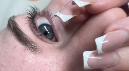 Close-up of a client's eye with French nails at Angelica’s Glow Bar, Maple Ridge, British Columbia, CA.