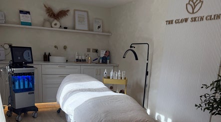 Elegant treatment room at The Glow Skin Clinic in Caddington, Luton, England, GB, showcasing modern wellness equipment.