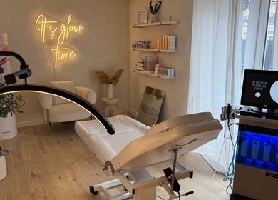 Relaxing treatment room at The Glow Skin Clinic, Caddington, Luton, England, GB with spa equipment and decor.