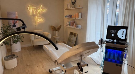 Relaxing treatment room at The Glow Skin Clinic, Caddington, Luton, England, GB with spa equipment and decor.