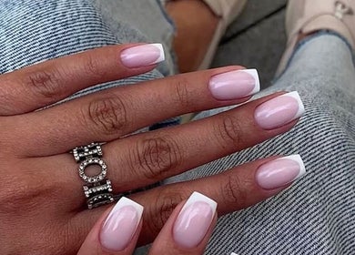 Elegant French manicure at Sandu Beauty & Wellness Hollywood, Florida, US. Perfect pink and white nail design.
