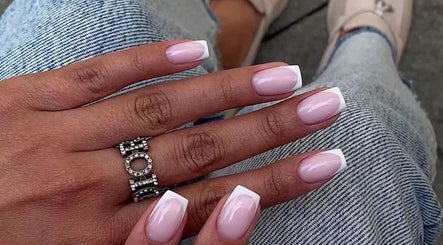 Elegant French manicure at Sandu Beauty & Wellness Hollywood, Florida, US. Perfect pink and white nail design.