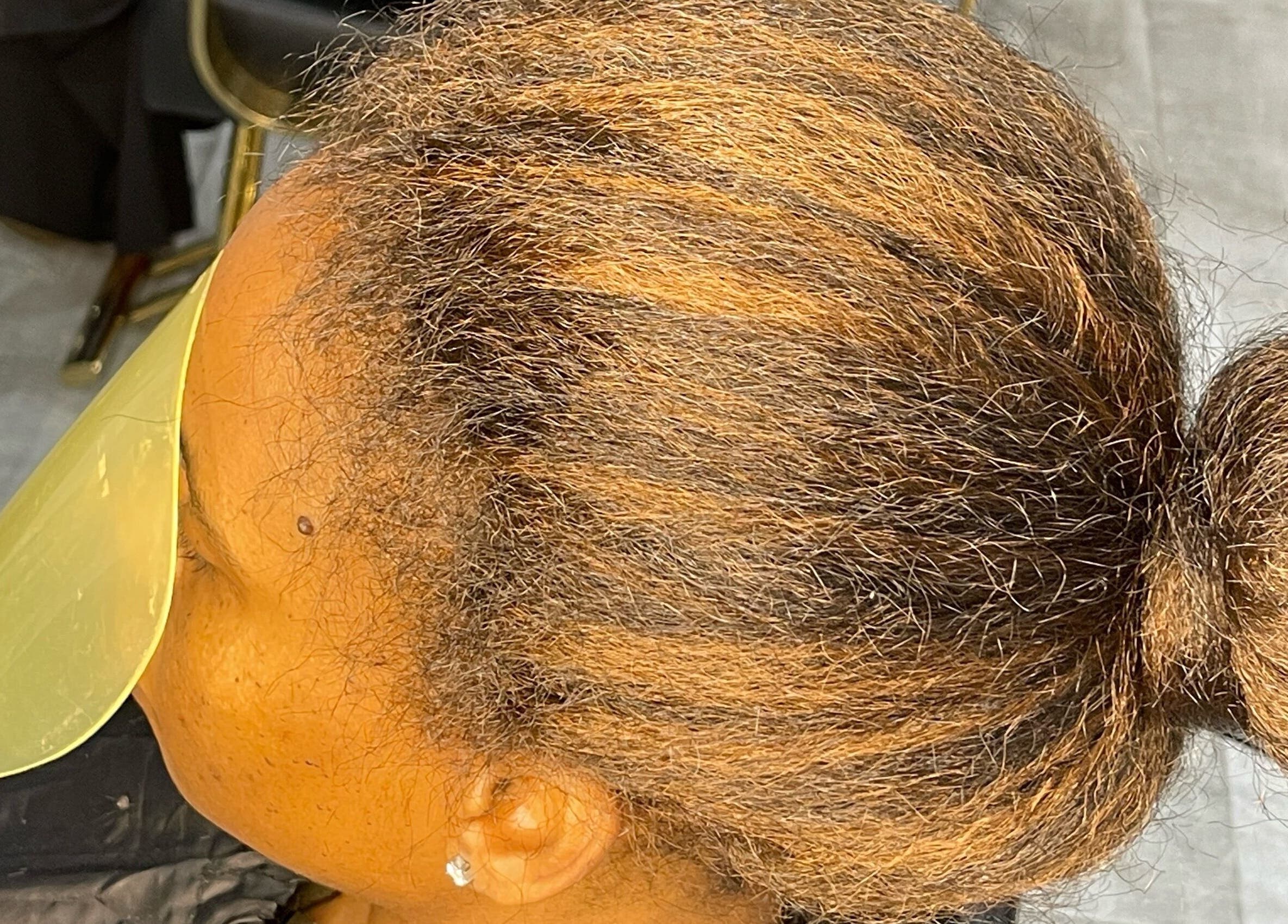 Top view of a sleek brown hairstyle at Milees Beauty Studio, Pretoria, Gauteng, ZA.