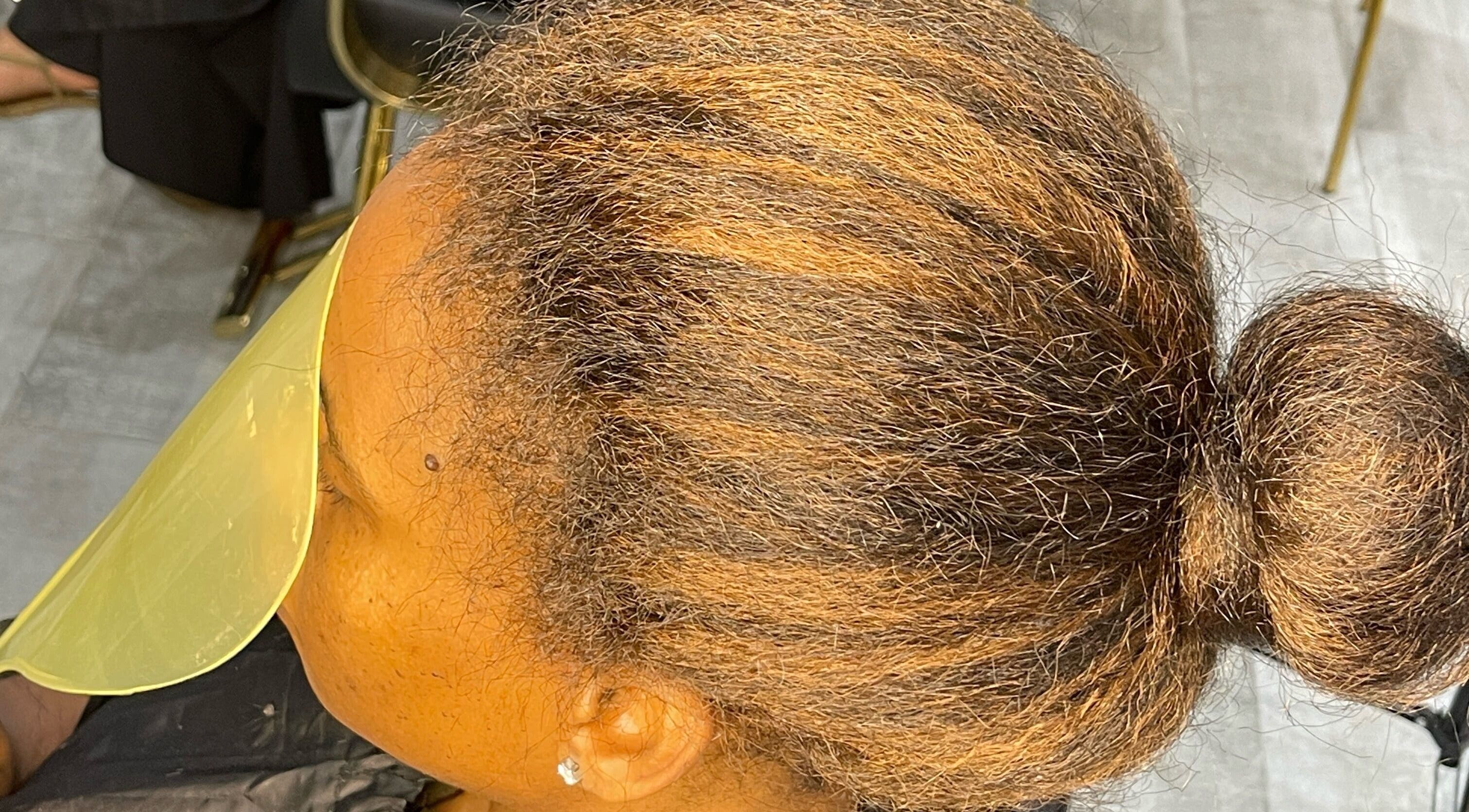 Top view of a sleek brown hairstyle at Milees Beauty Studio, Pretoria, Gauteng, ZA.