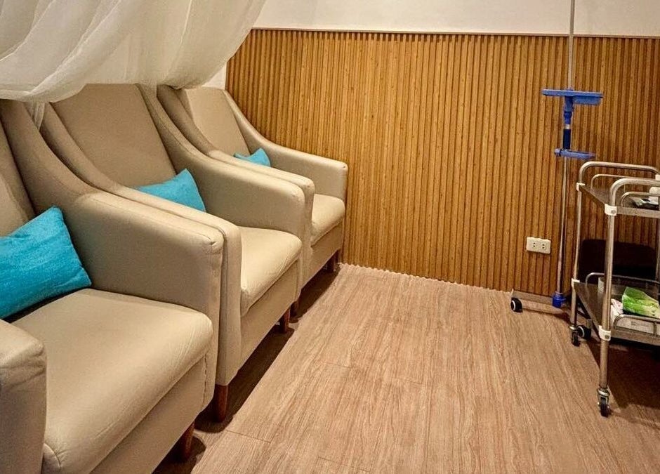 Relaxing lounge with beige chairs at Skin Desyre Aesthetic Clinic - Cainta, Cainta, Calabarzon, PH.