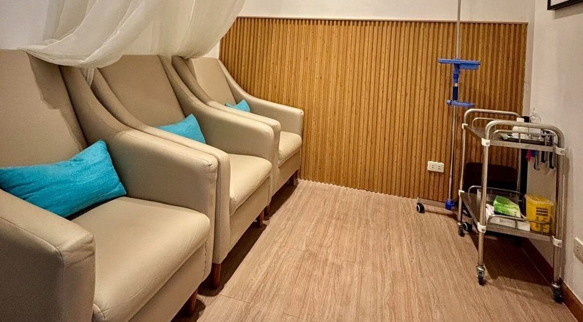 Relaxing lounge with beige chairs at Skin Desyre Aesthetic Clinic - Cainta, Cainta, Calabarzon, PH.