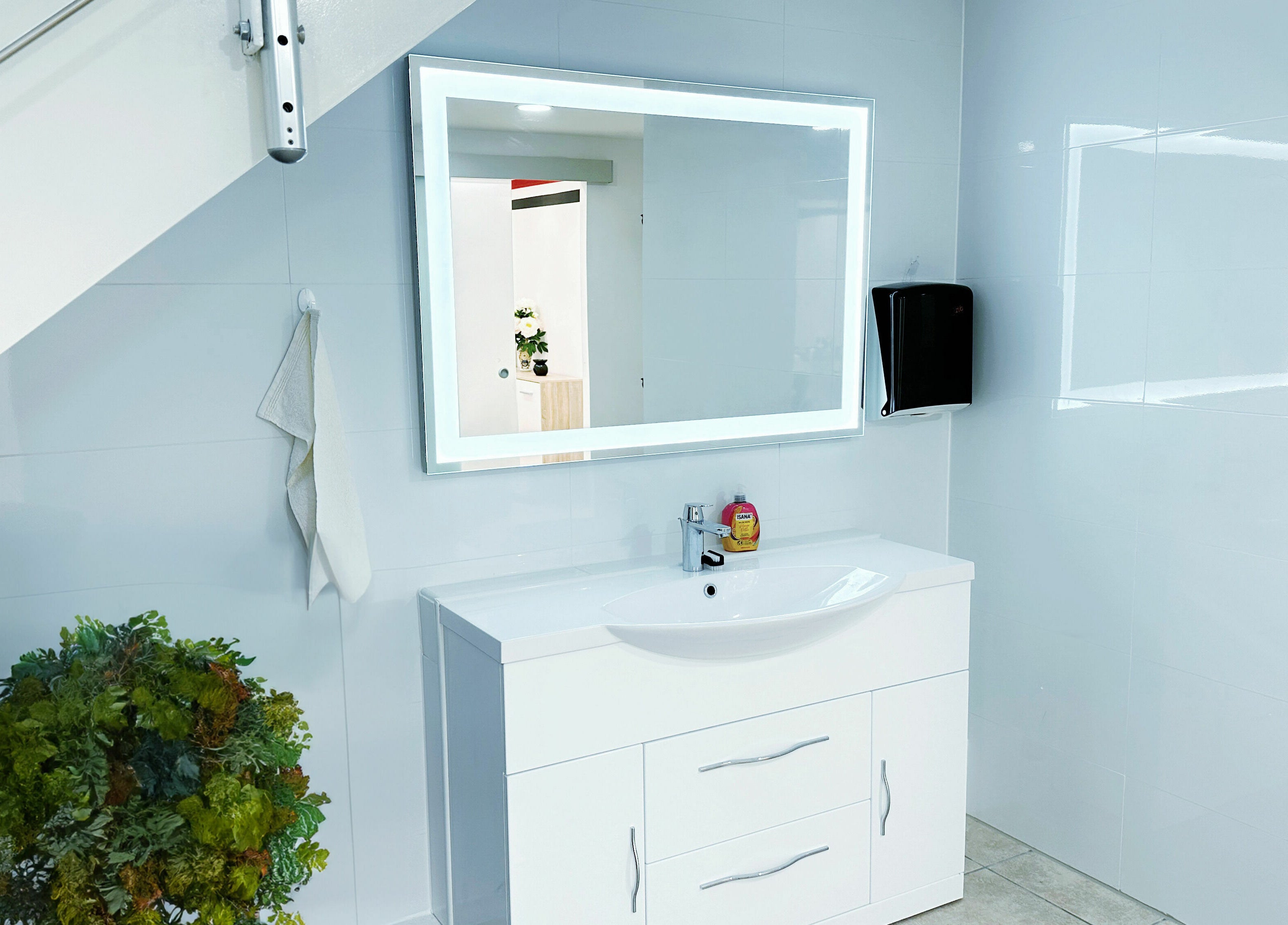 Stylish washroom at DUVI Nails with sleek sink and mirror in Zürich, Zürich, CH.