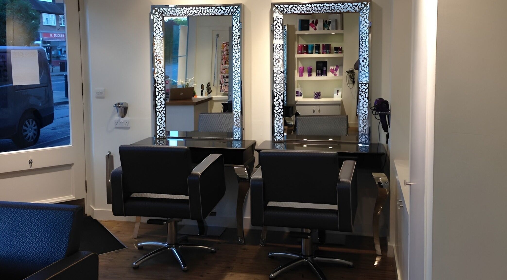 Elegant interior at Ben Forrest Hair Salon Ham, Kingston upon Thames, England, GB showcasing stylish mirrored stations.