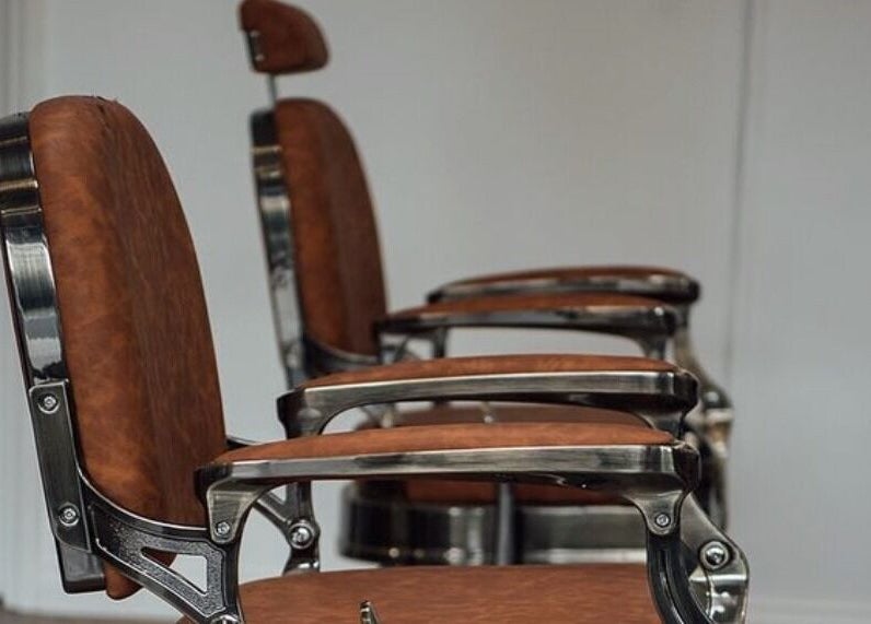 Elegant barber chairs at Blck and Brwn Barber Shop, Melbourne, Victoria, AU, offering premium comfort.