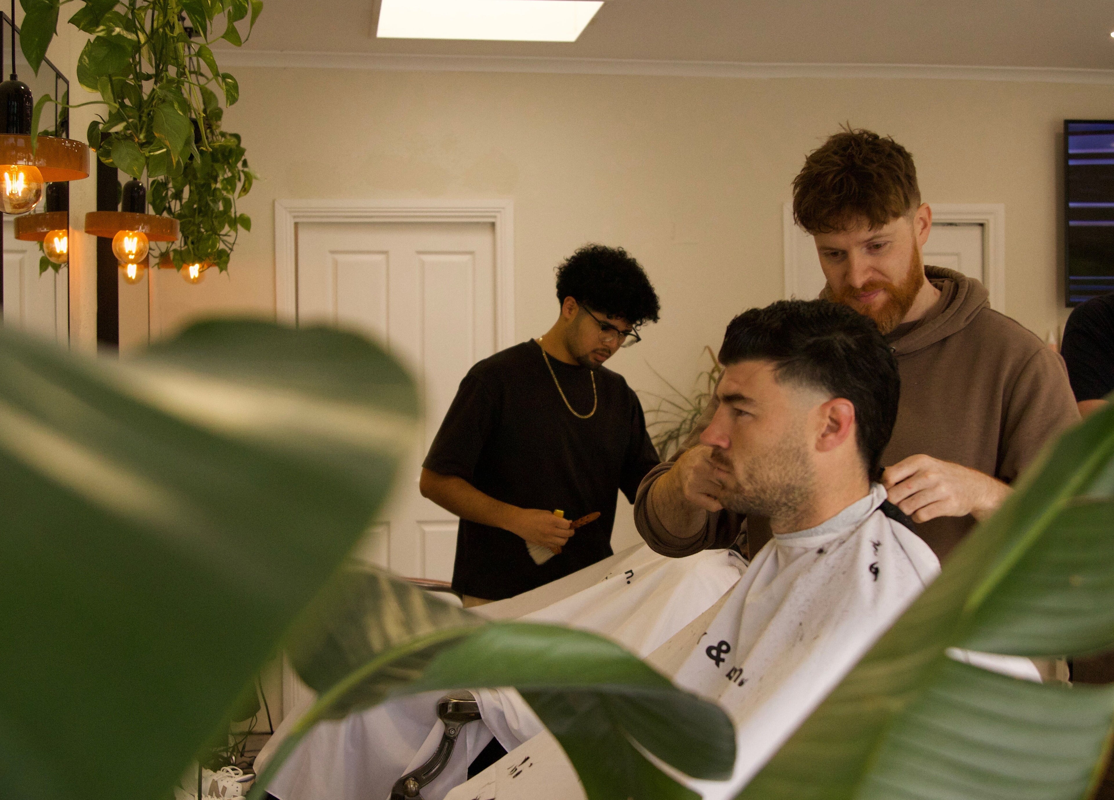 Stylish haircut at Blck and Brwn Barber Shop, Melbourne, Victoria, AU, with modern decor and relaxed atmosphere.