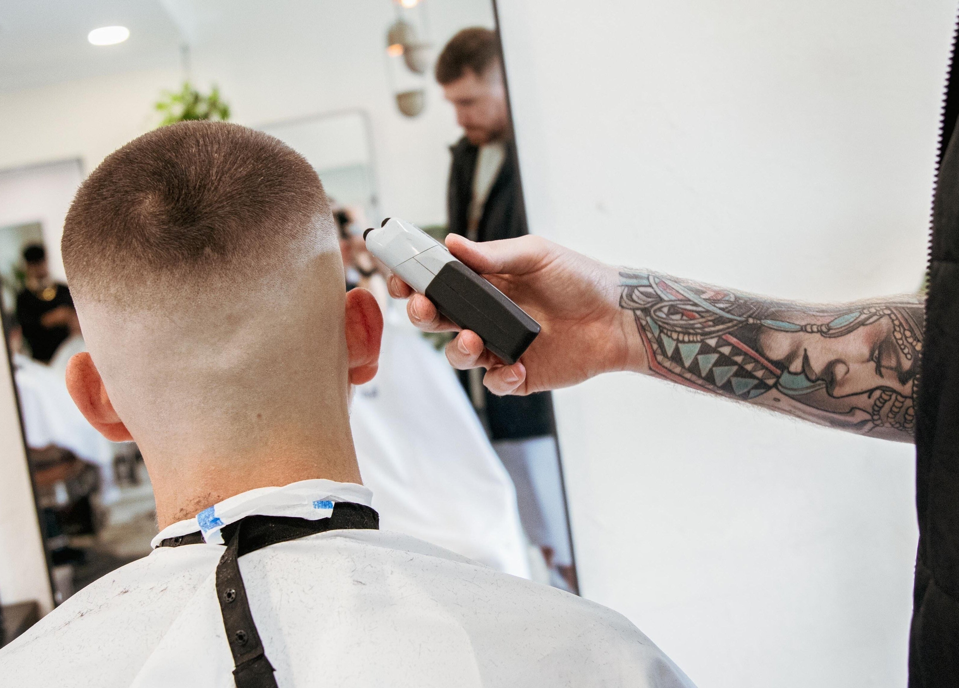 Precision haircut at Blck and Brwn Barber Shop in Melbourne, Victoria, AU showcasing expert barber skills.