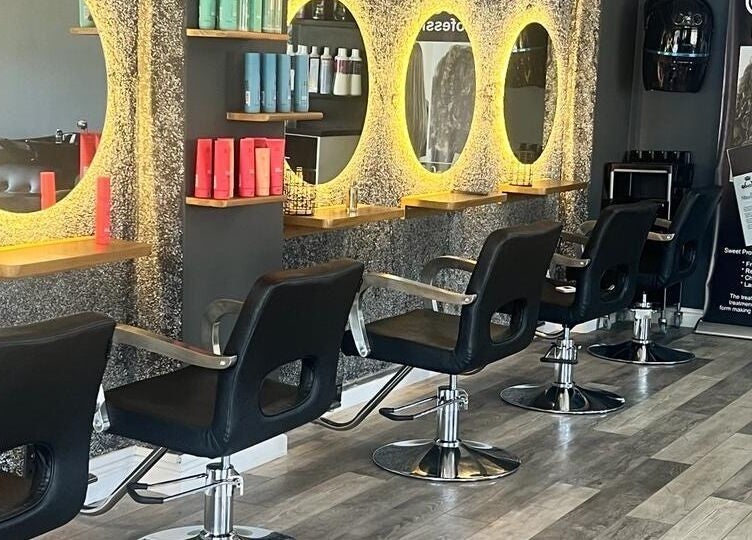 Elegant salon layout at La Bella's Hair and Beauty Salon, Cape Town, Western Cape, ZA, featuring modern styling chairs.