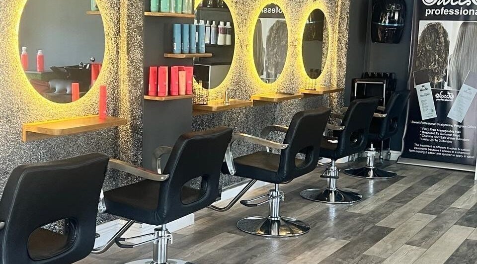 Elegant salon layout at La Bella's Hair and Beauty Salon, Cape Town, Western Cape, ZA, featuring modern styling chairs.