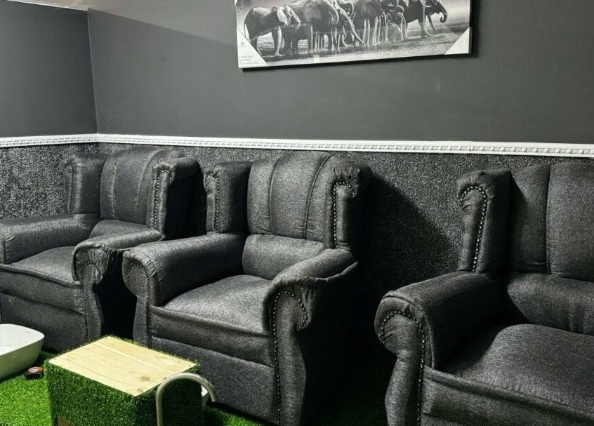 Cozy chairs at La Bella's Hair and Beauty Salon in Cape Town, Western Cape, ZA, offering a serene relaxation area.