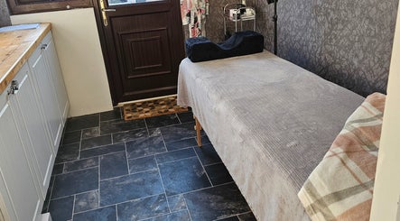 Kirstie Richards treatment room with massage bed in Redcar, England, GB.