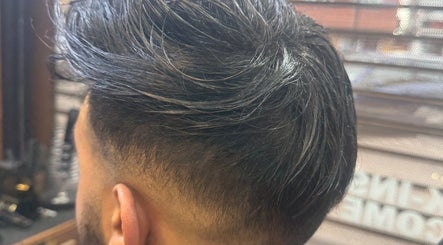 Close-up of trendy men's haircut at HairSystem Studio, Walton-on-Thames, England, GB.
