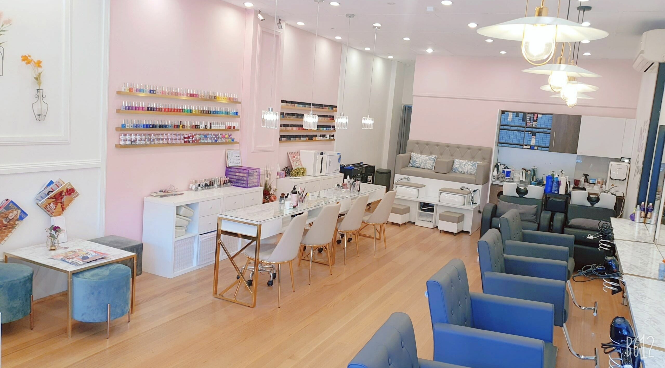 Elegant interior of Betterday Hair&Beauty in Newtown, NSW, AU showcasing nail and hair care stations.