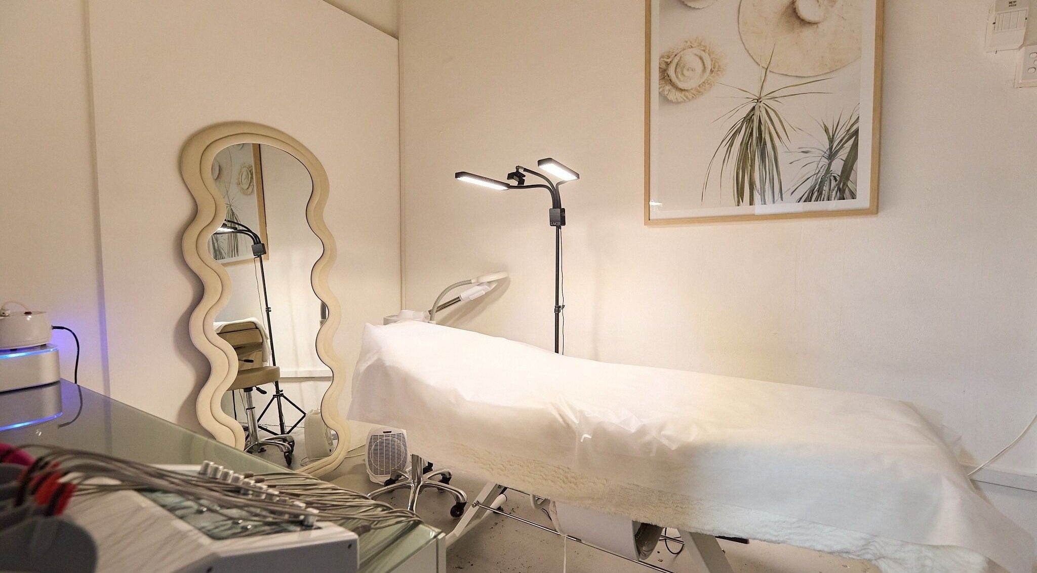 Tranquil treatment room at Gbeauty, Surry Hills, New South Wales, AU with modern decor and soft lighting.