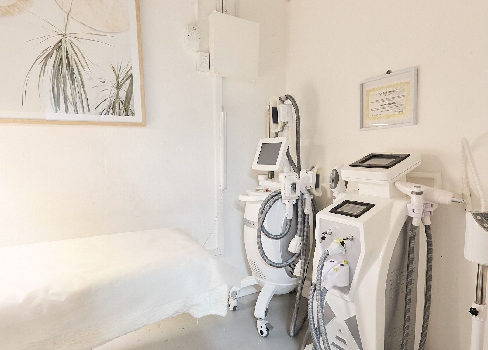 Advanced beauty equipment at Gbeauty, Surry Hills, New South Wales, AU, showcasing a serene treatment room.