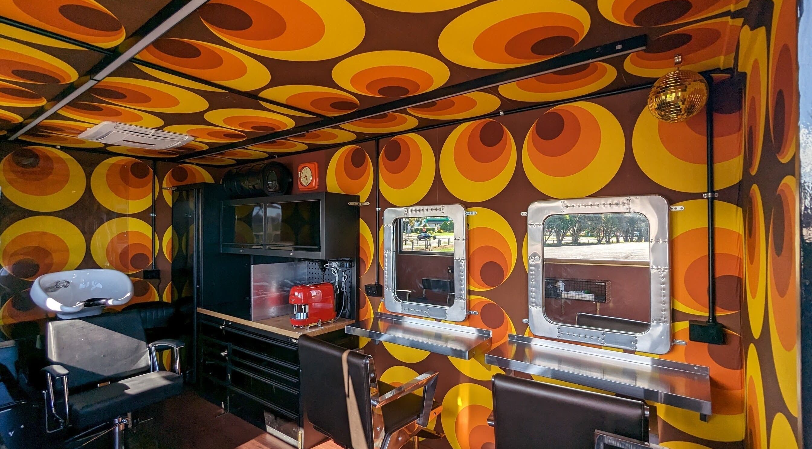 Retro-themed interior of Raw Heads Hair Salon in Eagle Vale, New South Wales, AU featuring bold patterns.