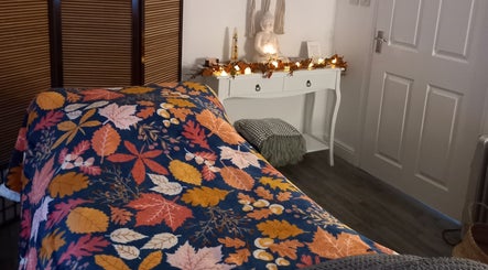 Cozy massage room at Skin2Sole, Wath Upon Dearne, England, decorated with autumn leaf blanket.
