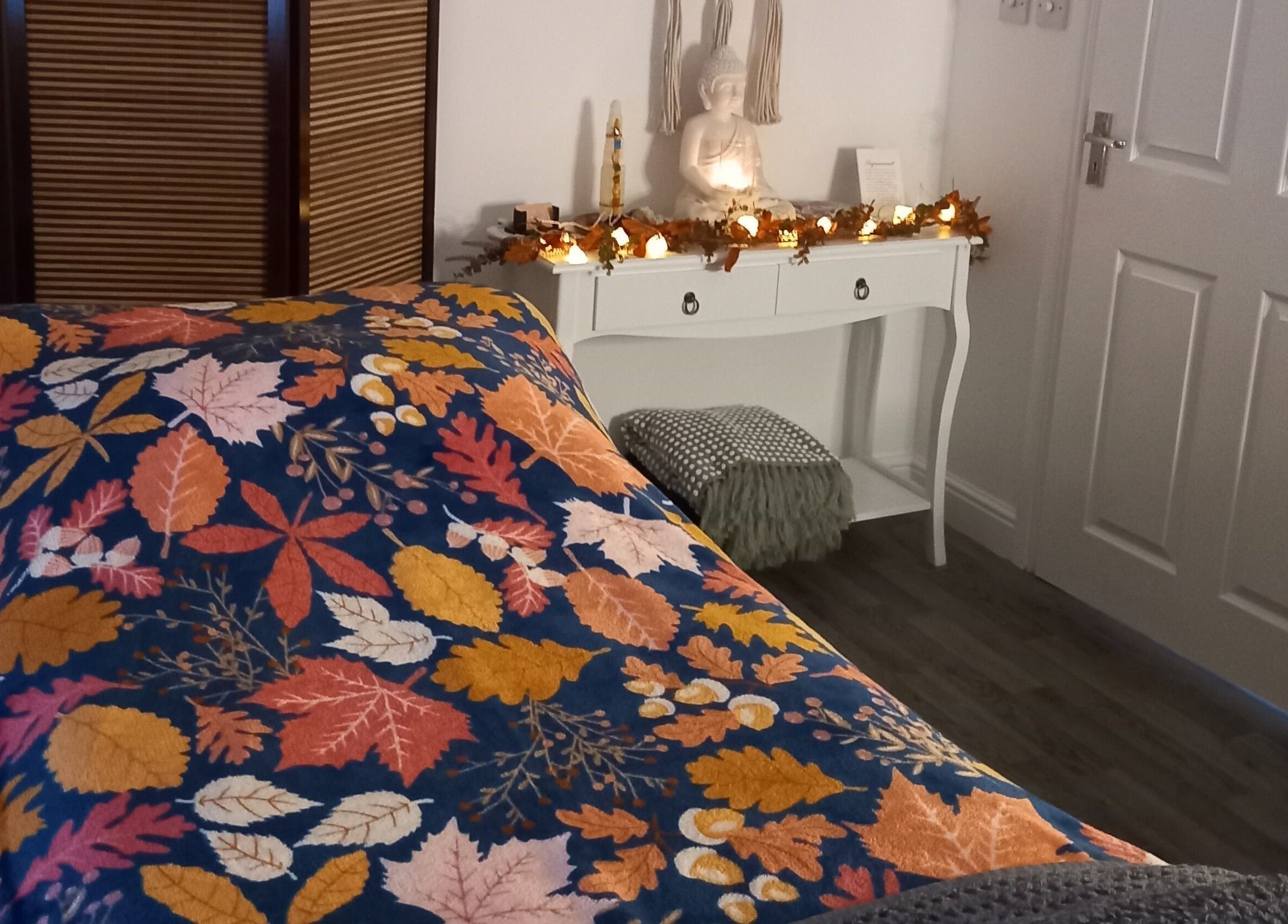 Relaxing treatment room at Skin2Sole, Wath Upon Dearne, England, GB, featuring autumn-themed decor.