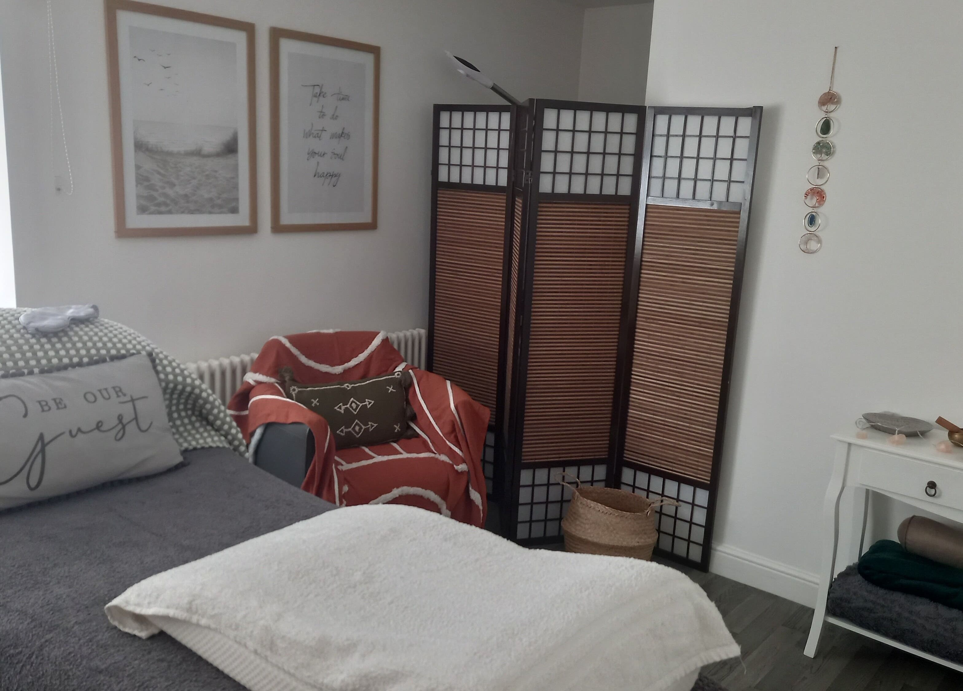 Relaxing interior of Skin2Sole, Wath Upon Dearne, England with cozy decor and massage bed.