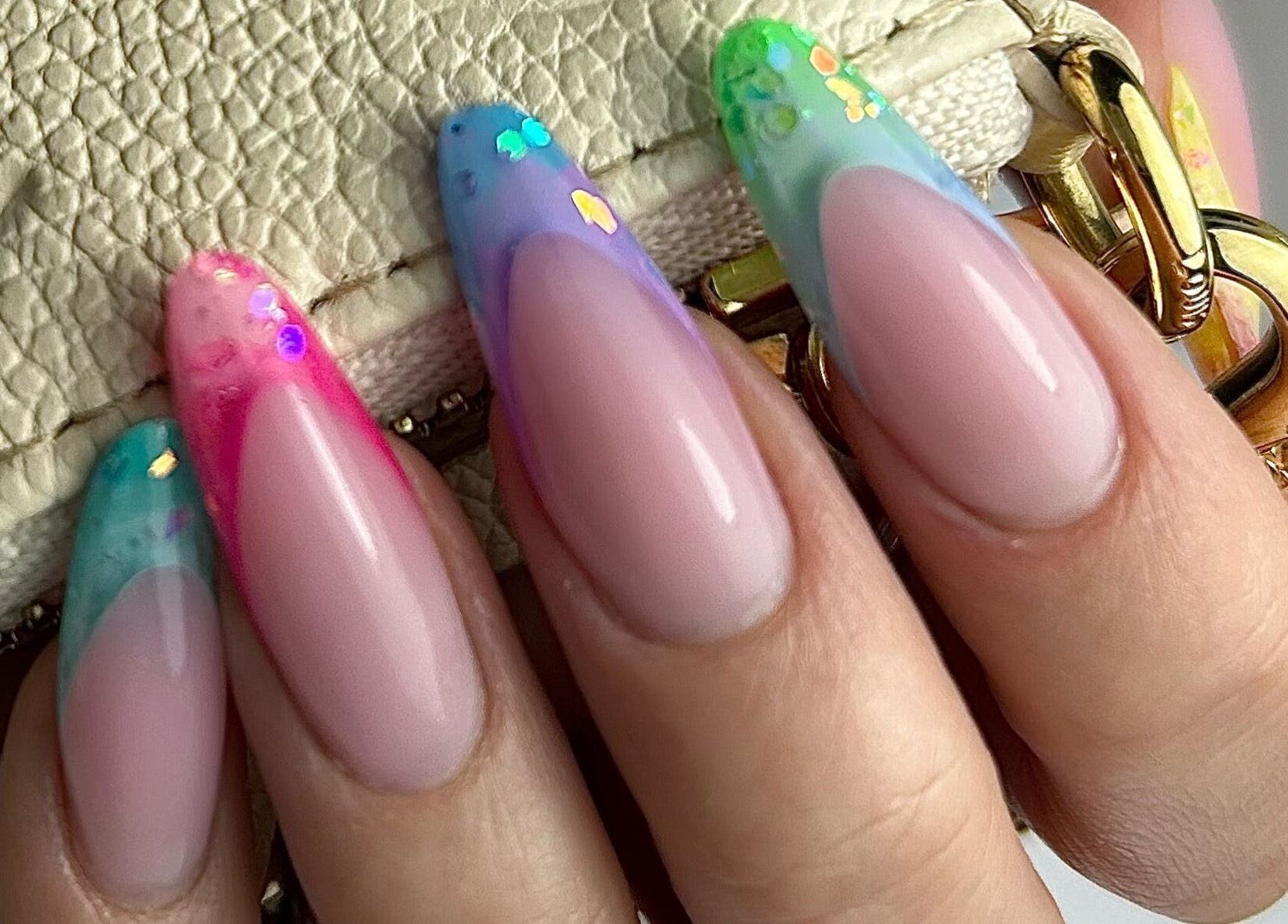 Colorful nail art by Pink Nails by Alexandra in Basingstoke, England, GB showcasing vibrant designs on manicured nails.