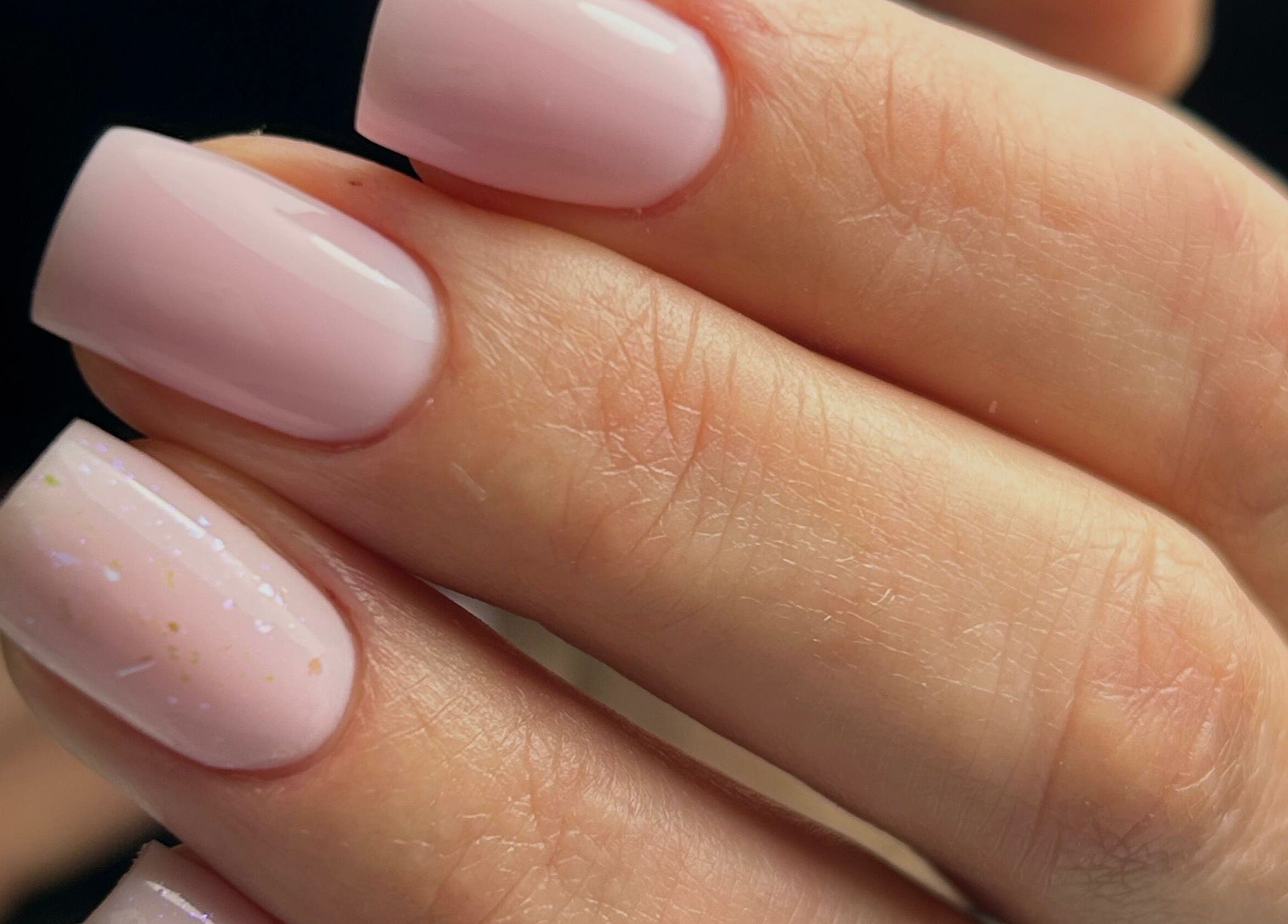Elegant pink manicure at Pink Nails by Alexandra in Basingstoke, England, GB, featuring glossy finish.