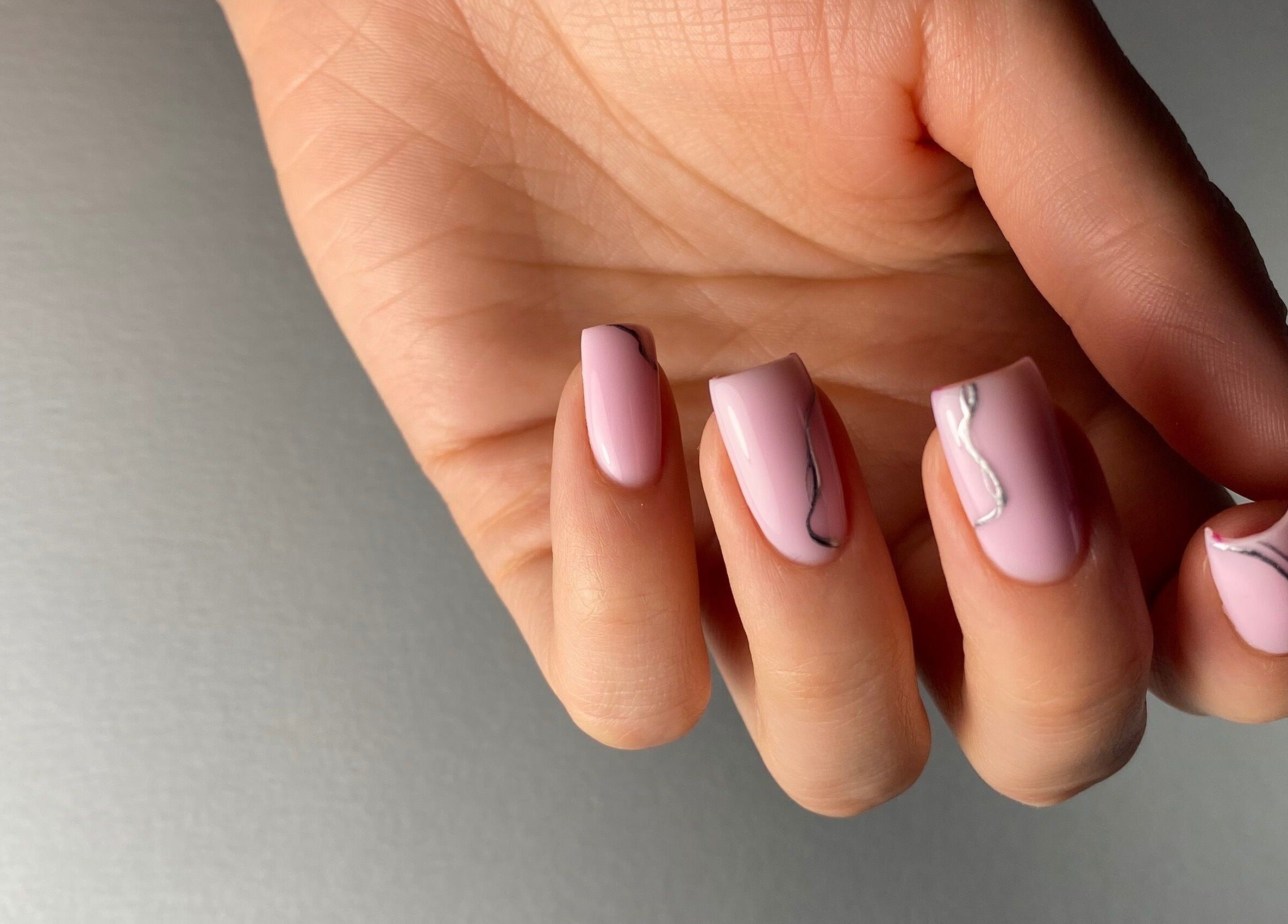 Close-up of elegant pink nail art at Pink Nails by Alexandra, Basingstoke, England, GB.