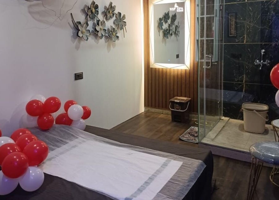 Relaxing treatment room at VIP Spa (Unisex), Gurugram, Haryana, IN, decorated with balloons for a serene ambiance.