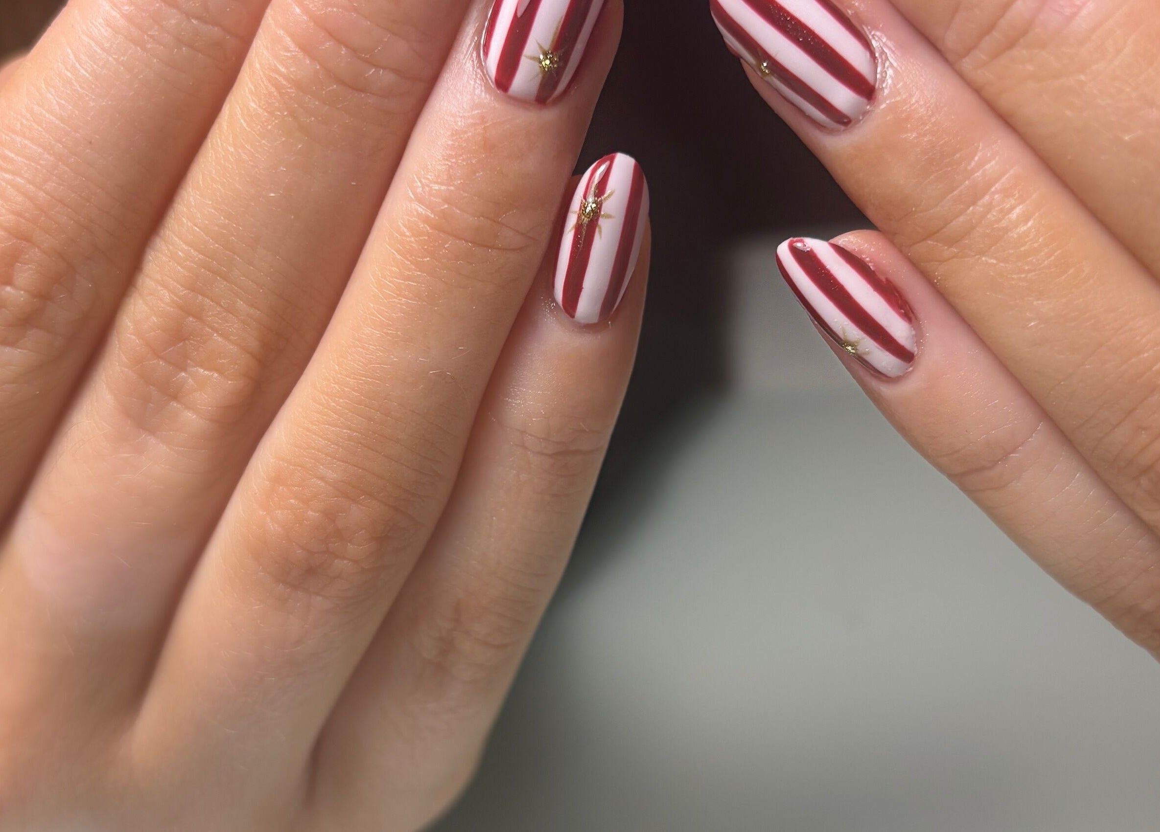 Striped nail art with stars at Nails by Evangelia, Pontefract, England, GB.