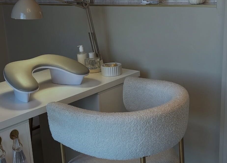 Cozy nail salon setup at Nails by Evangelia, Pontefract, England, GB showcasing comfortable seating and elegant decor.