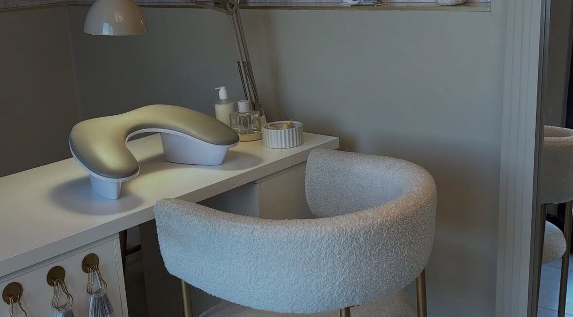 Cozy nail salon setup at Nails by Evangelia, Pontefract, England, GB showcasing comfortable seating and elegant decor.