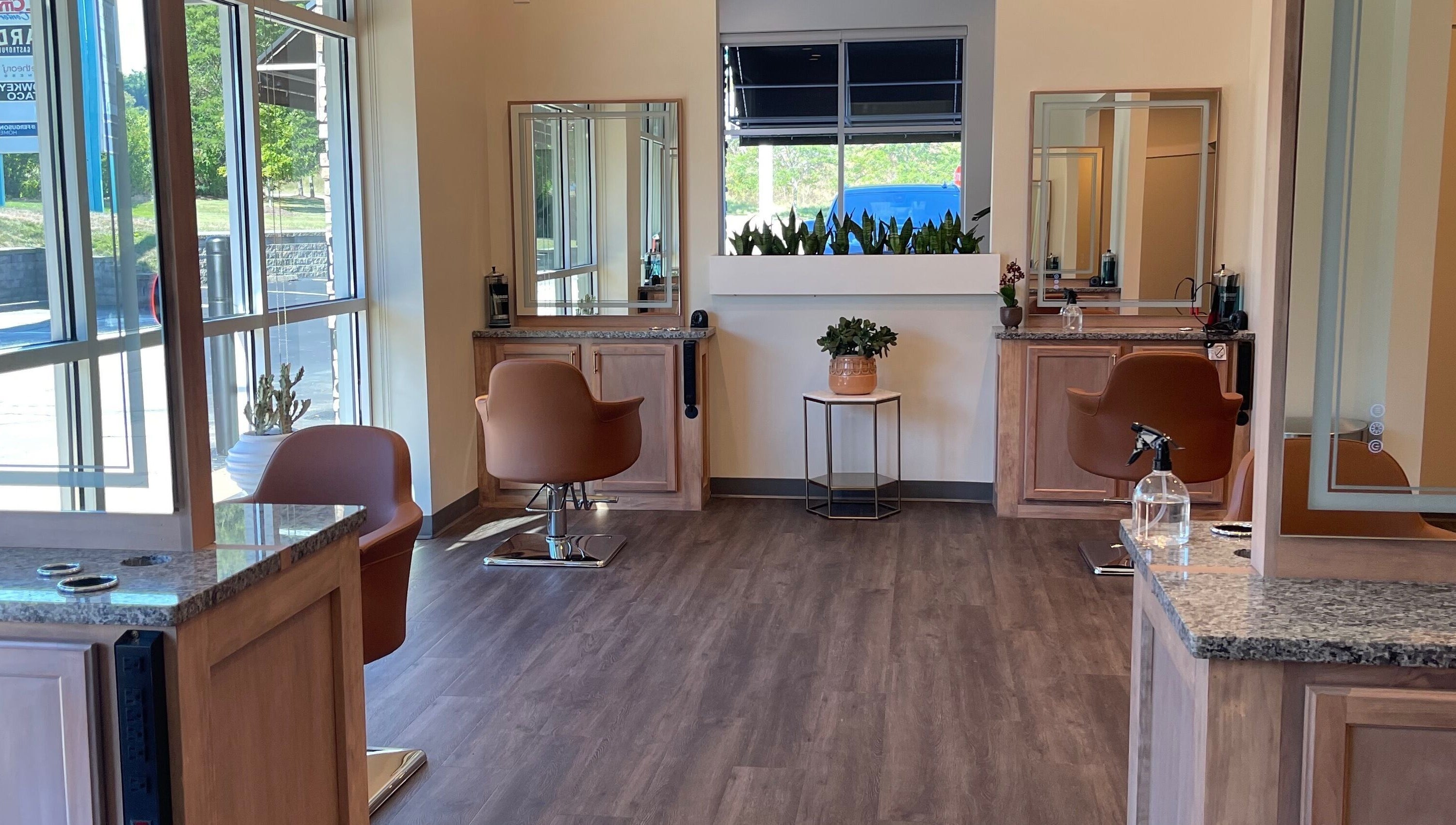 Interior of Alora Salon, Pittsburgh, Pennsylvania, US, featuring stylish chairs and modern decor.