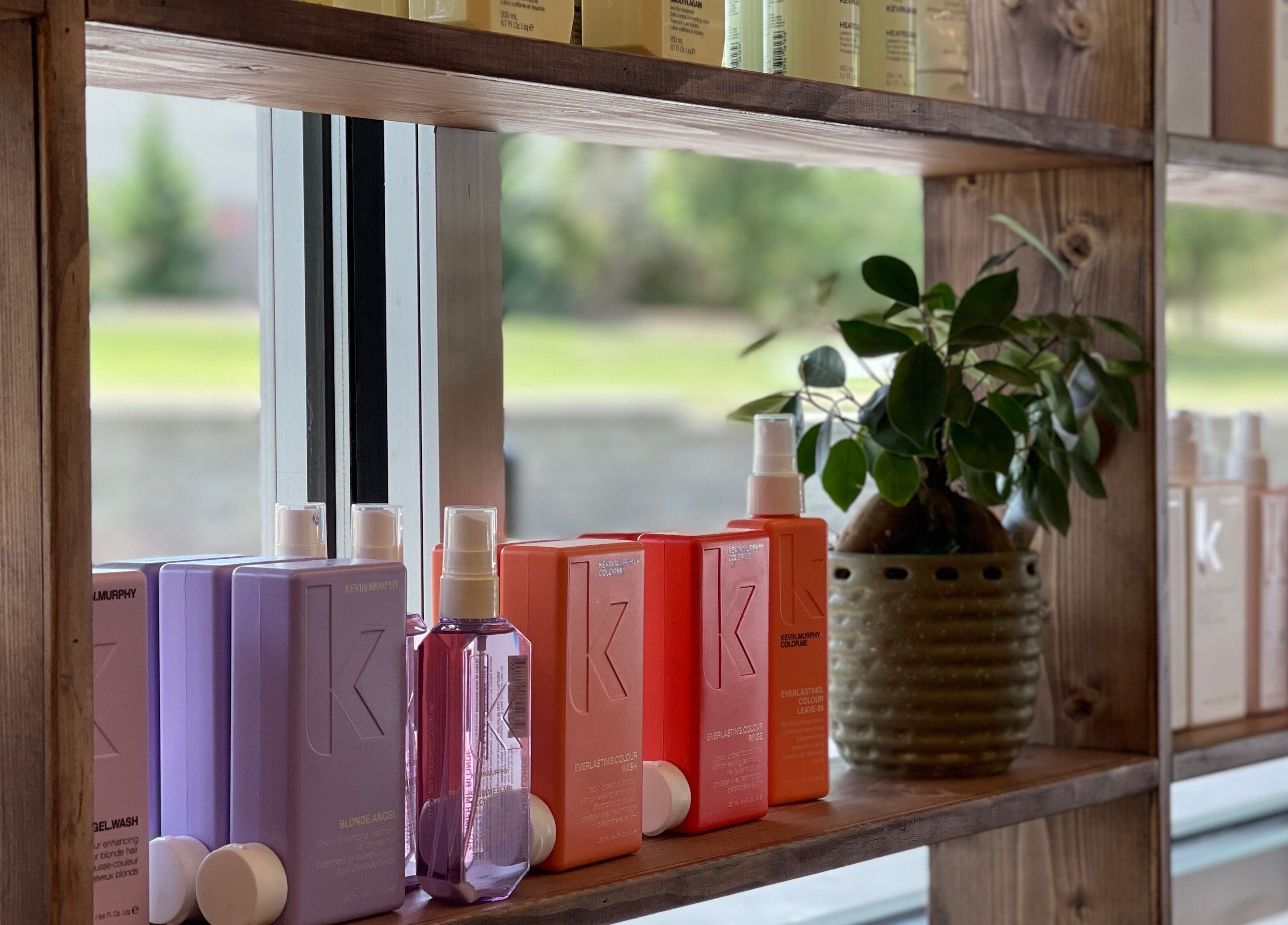 Alora Salon's curated shelf with Kevin Murphy products in Pittsburgh, Pennsylvania, US.
