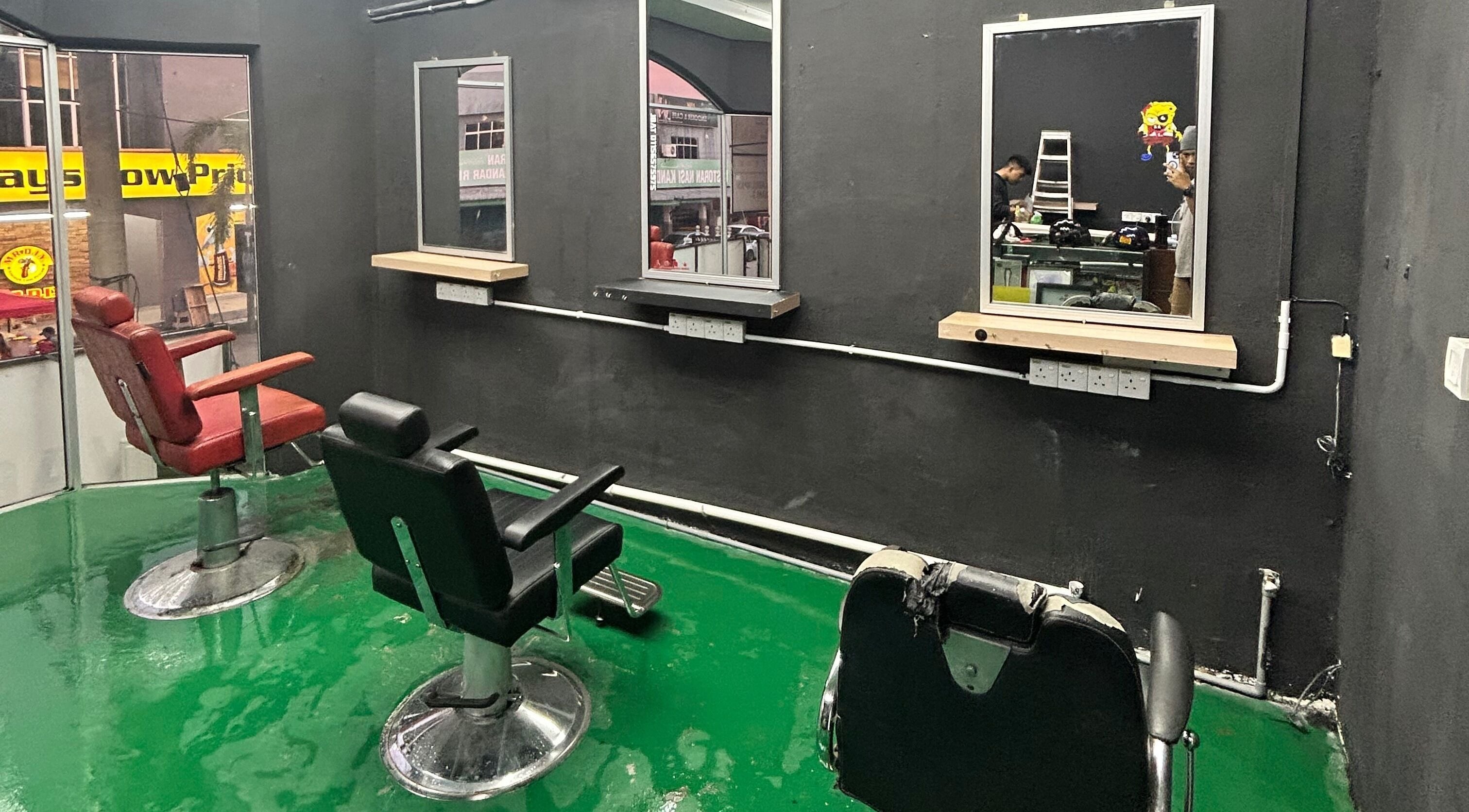 Modern barber chairs in JBAT Barbershop, Nibong Tebal, Pulau Pinang, MY, awaiting customers.