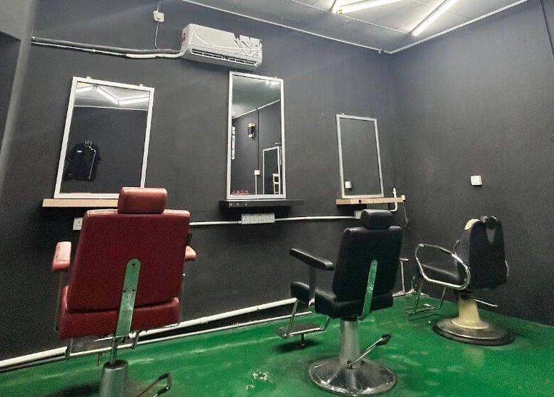 Interior of JBAT Barbershop in Nibong Tebal, Pulau Pinang, MY with modern barber chairs and mirrors.