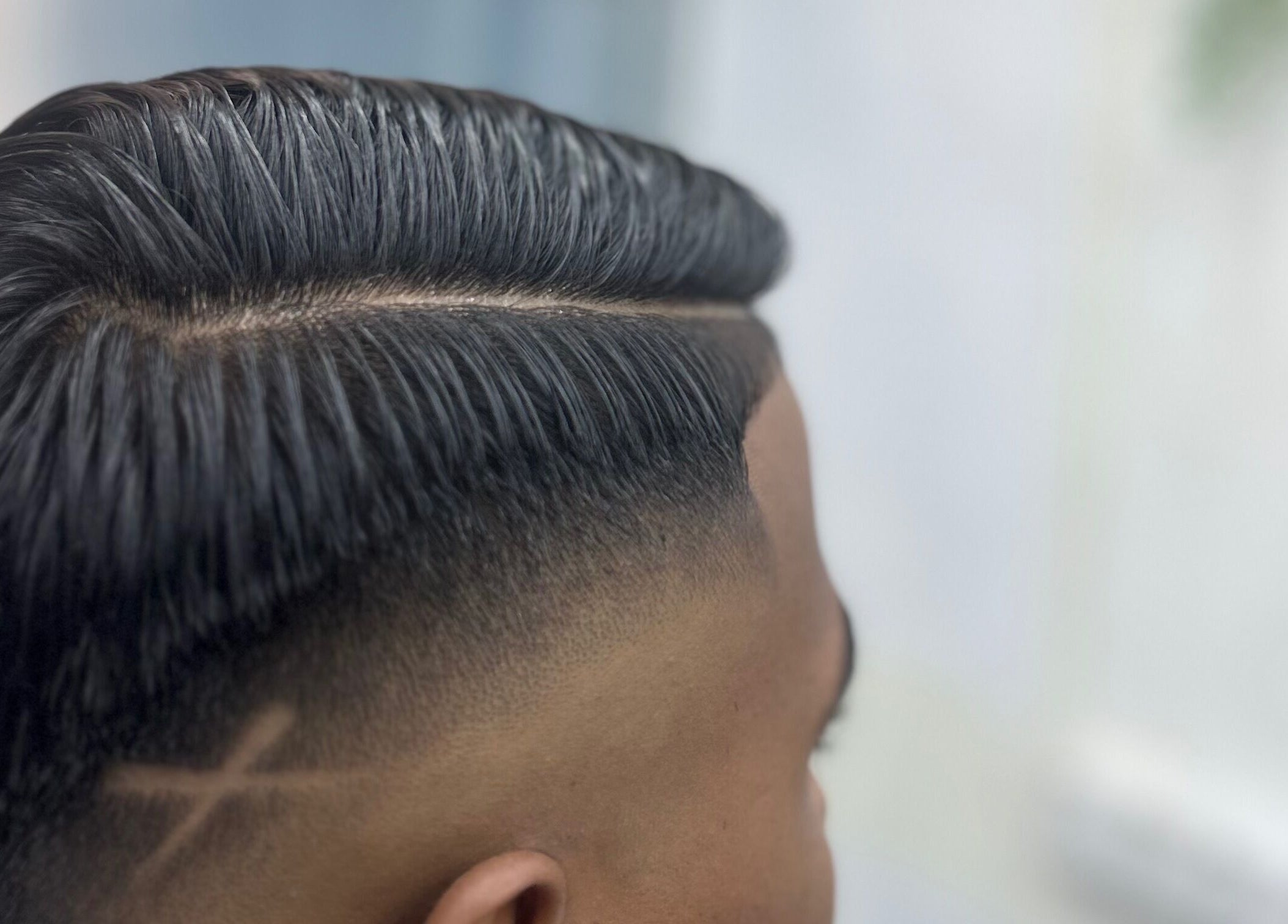 Precision haircut at JBAT Barbershop, Nibong Tebal, Pulau Pinang, MY. Sharp fade with design.