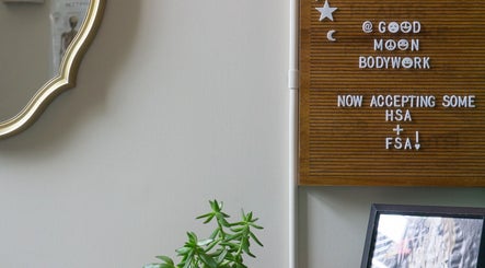 Decorative board at Good Moon Bodywork, Buffalo, New York. Now accepting HSA and FSA payments.