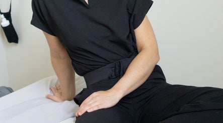 Relaxed therapist at Good Moon Bodywork (Jaz Frazier, LMT), Buffalo, New York, US.